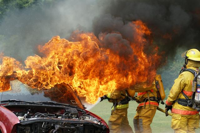 SLVFD members and Lewis VFD member Mike Flynn appear engulfed in flame during vehicle fire training in Keeseville NY 8/21/2010